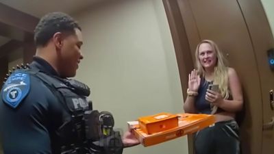 Woman ordered pizza, but when the door opened, 2 cops were holding it. She thought it was a joke