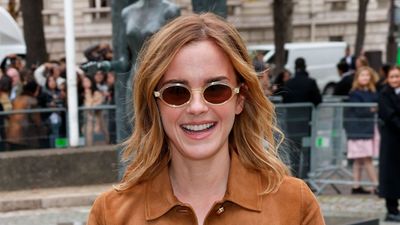 Emma Watson reveals how to style this season's chicest coat trend at Paris Fashion Week
