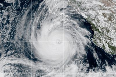 Tropical Storm Jerry churns in the Atlantic as a weakened Priscilla nears Mexico's Baja peninsula