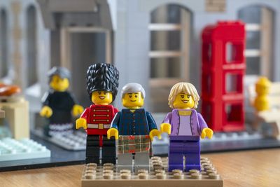 Charles and Camilla given Lego figurines of themselves during village visit