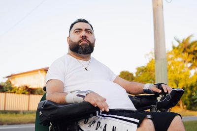 Kieron relies on NDIS after surviving a catastrophic diving accident – but new rules could put his life at risk