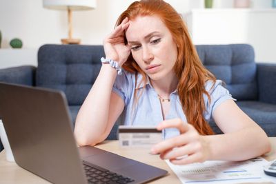 Gen Z credit scores are having a ‘catastrophic drop’—student loans and doomspending may be to blame