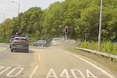 Dangerous driver smashes into car at roundabout during high speed chase