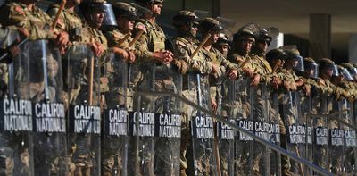 Explainer: what powers does Trump actually have to deploy the military to US cities?