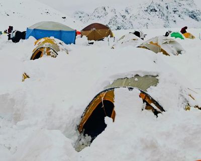 Non-stop snow, instant noodles and yaks: tales of being trapped on Everest