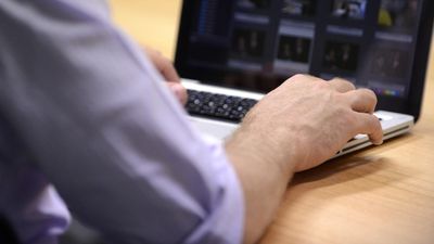 Cop unmasked after child abuse material charges