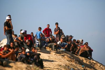 'Full Of Sorrow': Gazans Trek Home As Truce Begins