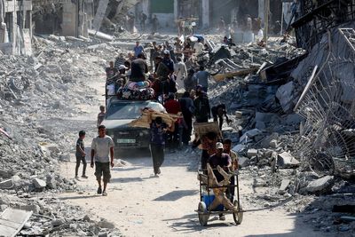 Ceasefire prompts mass departure from Gaza camps as families load vehicles to return home