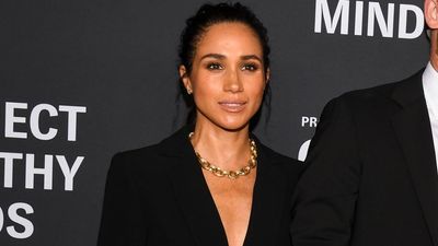 Meghan Markle just made a basic blazer sultry - her chunky chain and high pony were the ultimate finishing details