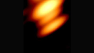 This is the world's 1st image of 2 black holes orbiting one another