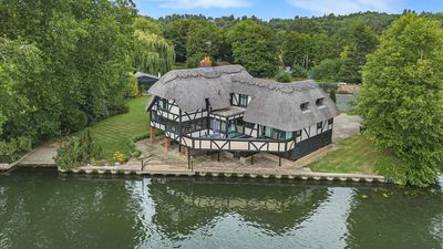 Mysterious 'floating' 1920s thatched commuter home next to the River Thames in Berkshire on sale for £2.45m