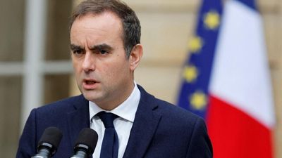 Reappointed French PM faces tight deadline to form government, negotiate budget