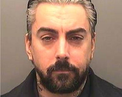 Two men arrested after Lostprophets singer Ian Watkins dies in prison attack