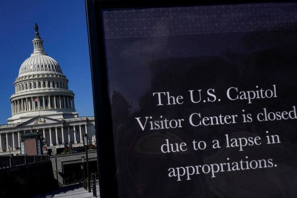 ‘Using us as political pawns’: federal workers reel over threats of firings and withheld back pay