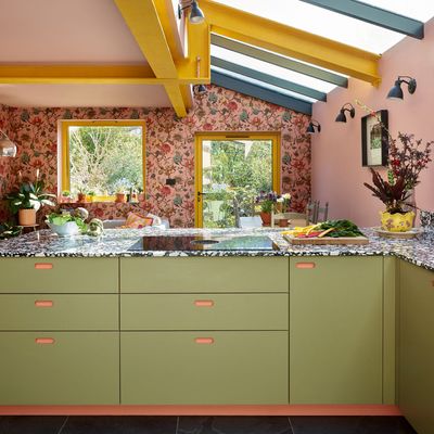 This kitchen is the epitome of joy with a mix of uplifting colours and patterns