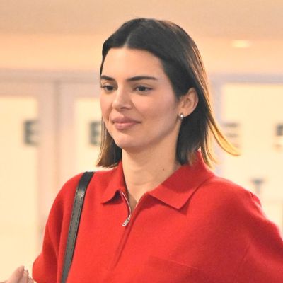 Kendall Jenner Styles Fall 2025's Track Jacket Trend With Classic Loafers and White Pants