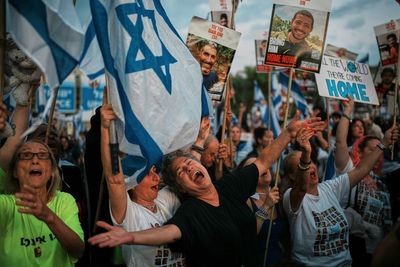 Israelis celebrate the return of hostages after ceasefire in Gaza, in photos