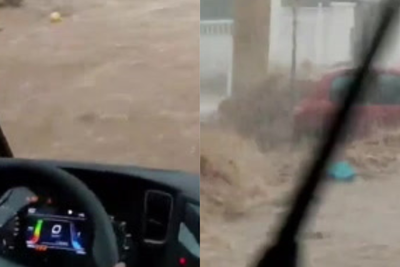 Trapped drivers battle raging torrents of mud water as flash floods rip through Spanish towns