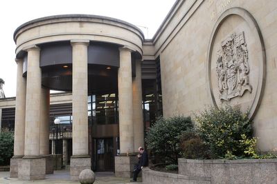 Teenager who pushed woman into path of train detained in psychiatric hospital