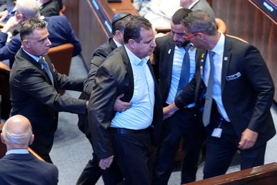 Donald Trump's address to Israel's Knesset dramatically halted by left-wing hecklers