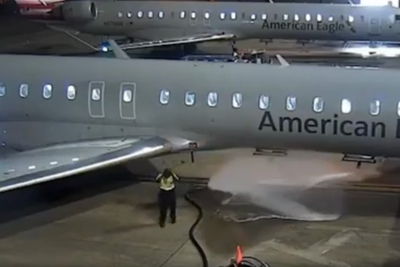 Airport worker drenches American Airlines plane and tarmac in gas after losing control of refueling hose