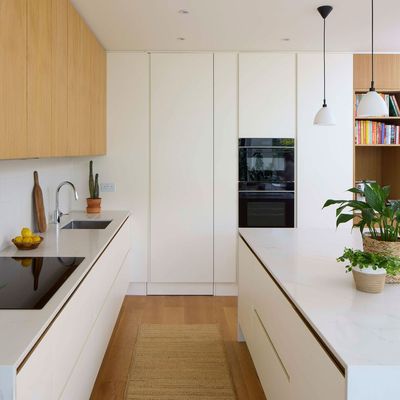 This kitchen became a clean-lined, clutter-free space full of hidden storage