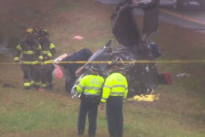 Plane crashes onto a Massachusetts highway, killing 2 and wounding 1 on the ground
