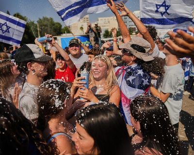 ‘I’m shaking all over’: hugs, tears and relief in Israel as Gaza hostages return