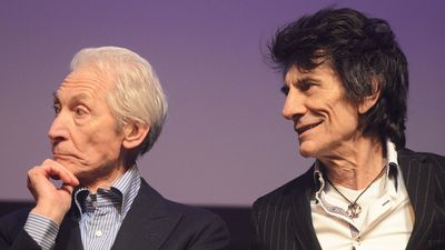 “He tried it when he came in and he said ‘I can’t do it as good as you, Ronnie. You get back on the drums.’”: When Charlie Watts ceded the drums to Ronnie Wood on a Stones track