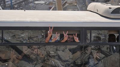 Freed Palestinian prisoners return home under Gaza ceasefire deal