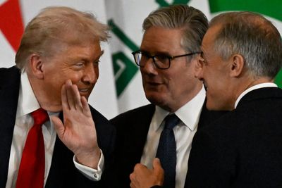 Canada’s prime minister caught on hot mic correcting Trump on his title after US leader’s gaffe