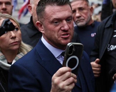 Police suspected Tommy Robinson had information relevant to acts of terrorism on phone, court told
