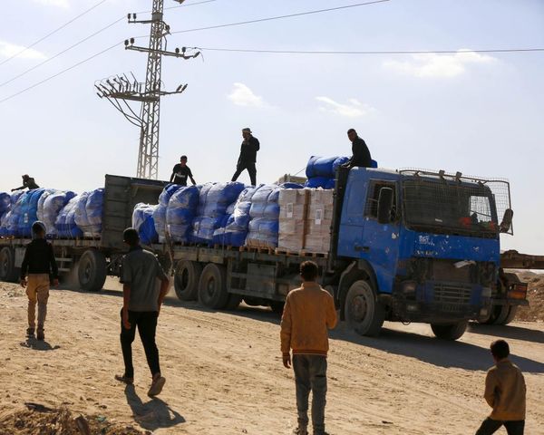 Israel limits aid into Gaza in dispute over hostage remains as ceasefire faces test