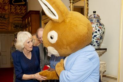 Queen meets Peter Rabbit as she wishes reading charity ‘happy 100th birthday’