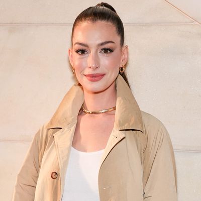 Anne Hathaway Challenges the Lake Como Dress Code in the Flared Jeans Trend and Adidas Sambas Sneakers