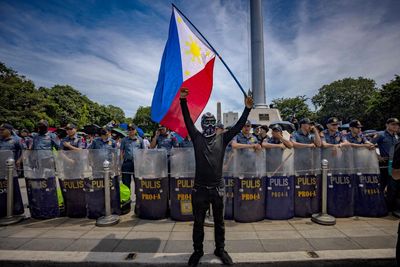 ‘She died because of the flood’: Filipinos rise up as outrage over corruption scandal grows