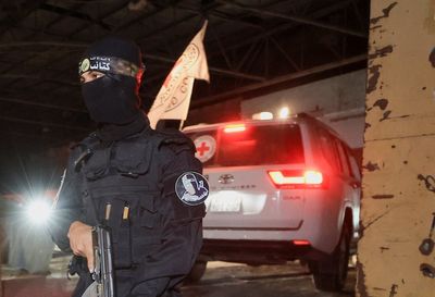 Israel says body returned by Hamas is not a hostage as fears over fragile ceasefire grow