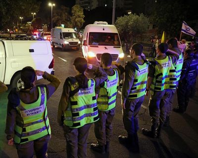 Body handed over by Hamas is not hostage, says Israel, as Palestinian dead ‘arrive back in cuffs’