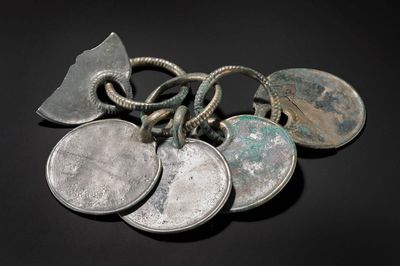 Museum staff describe ‘magical’ moment hoard’s silver colour was revealed