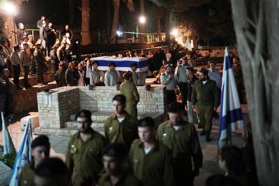Newly-released hostage attends funeral of his commander after body returned from Gaza