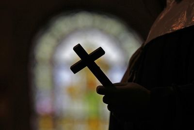 Ex-Catholic priest exploited family deaths to abuse disabled boy, police allege