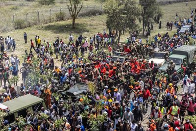 Police fire tear gas at thousands of mourners at former Kenyan PM Raila Odinga's public viewing