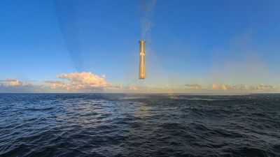 Watch SpaceX's Super Heavy Starship booster hover in mid-air before plunging into the sea (video)