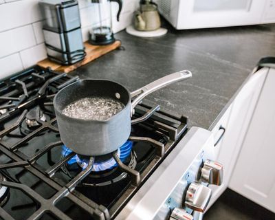 Wood burning and gas cooking hugely costly to healthcare systems, New Zealand study finds