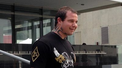 Bikie assassin questioned over terrorism offences