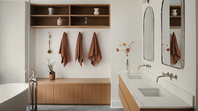 Forget Your Basic Laundry Basket, This Type of Storage Works Way Better for a Small Bathroom and It Also Comes With Open Shelving, too