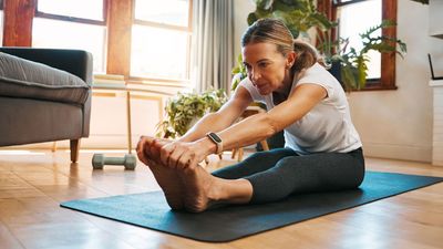 I'm a Pilates instructor - these 3 simple lower back stretches can ease pain and improve mobility in 5 minutes