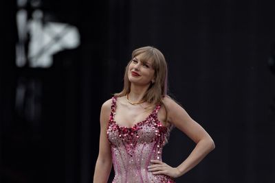 Taylor Swift retains number one album and single in UK charts for second week