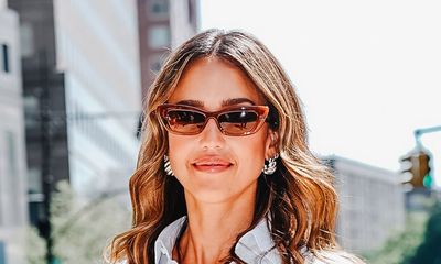 Jessica Alba wears Rixo's new floral dress with knee-high boots – a combination that works perfectly for cold-weather occasions