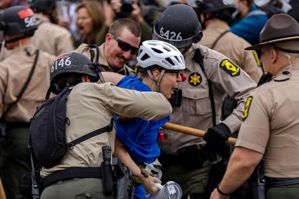 At least 11 detained after protesters and police clash outside Chicago Ice center